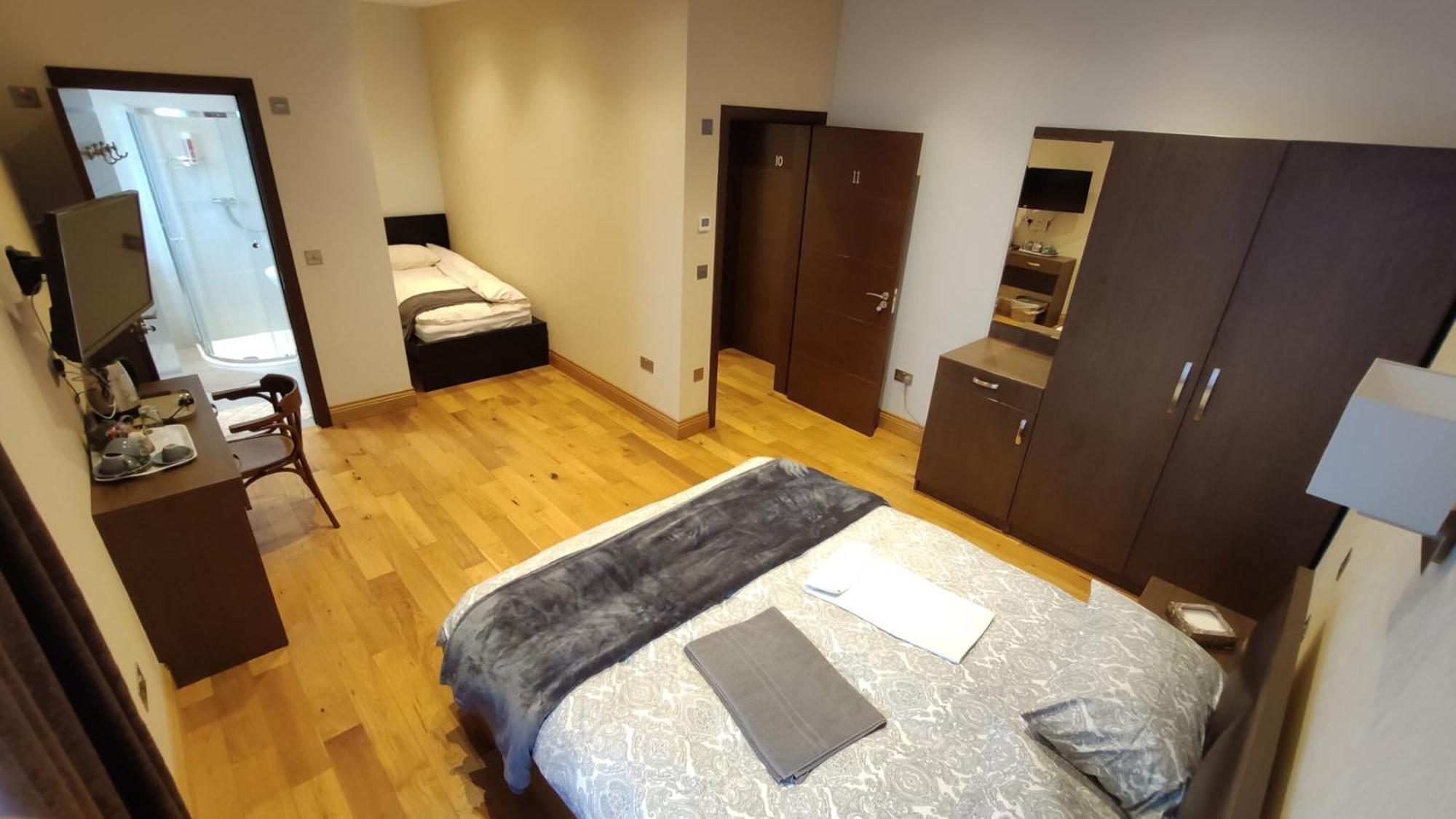 Deluxe Dreibettzimmer