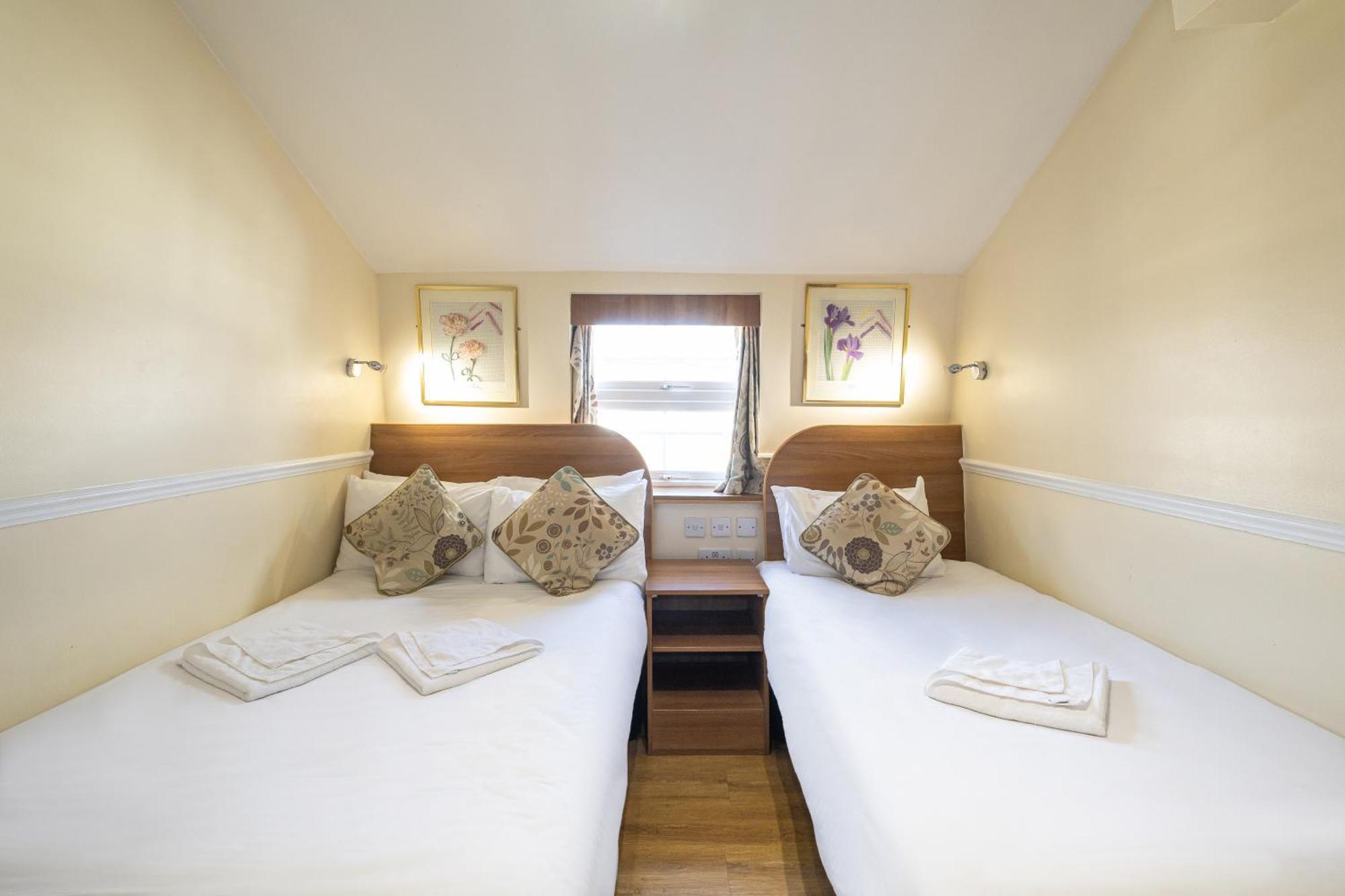 Dreibettzimmer